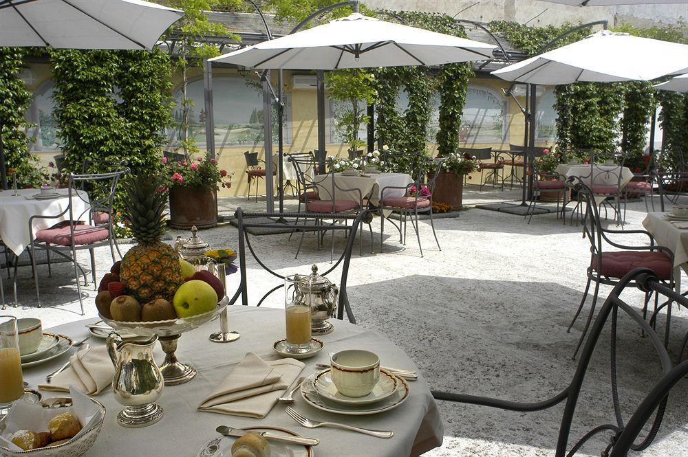 โรงแรมรีเลส เดลโอโรโลจิโอ ปิซา ร้านอาหาร รูปภาพ